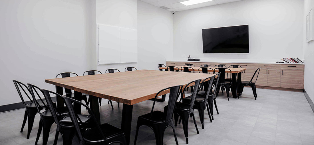 Clean and well-organized room at C Market Coffee, featuring a modern, minimalist design with ample space, sleek furnishings, and a bright, welcoming atmosphere that enhances the overall customer experience.