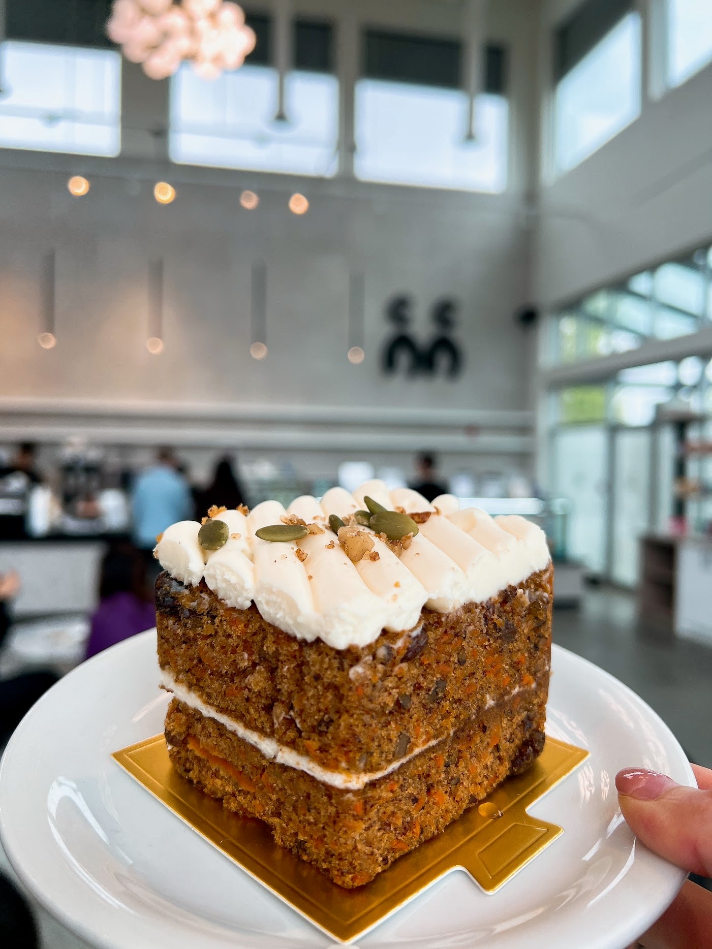 A Korean-owned café offering a spacious and bright environment, perfect for dining. The dishes are creative and delicious, with the Cinnamon Crumb and Carrot Cake being particular favorites.