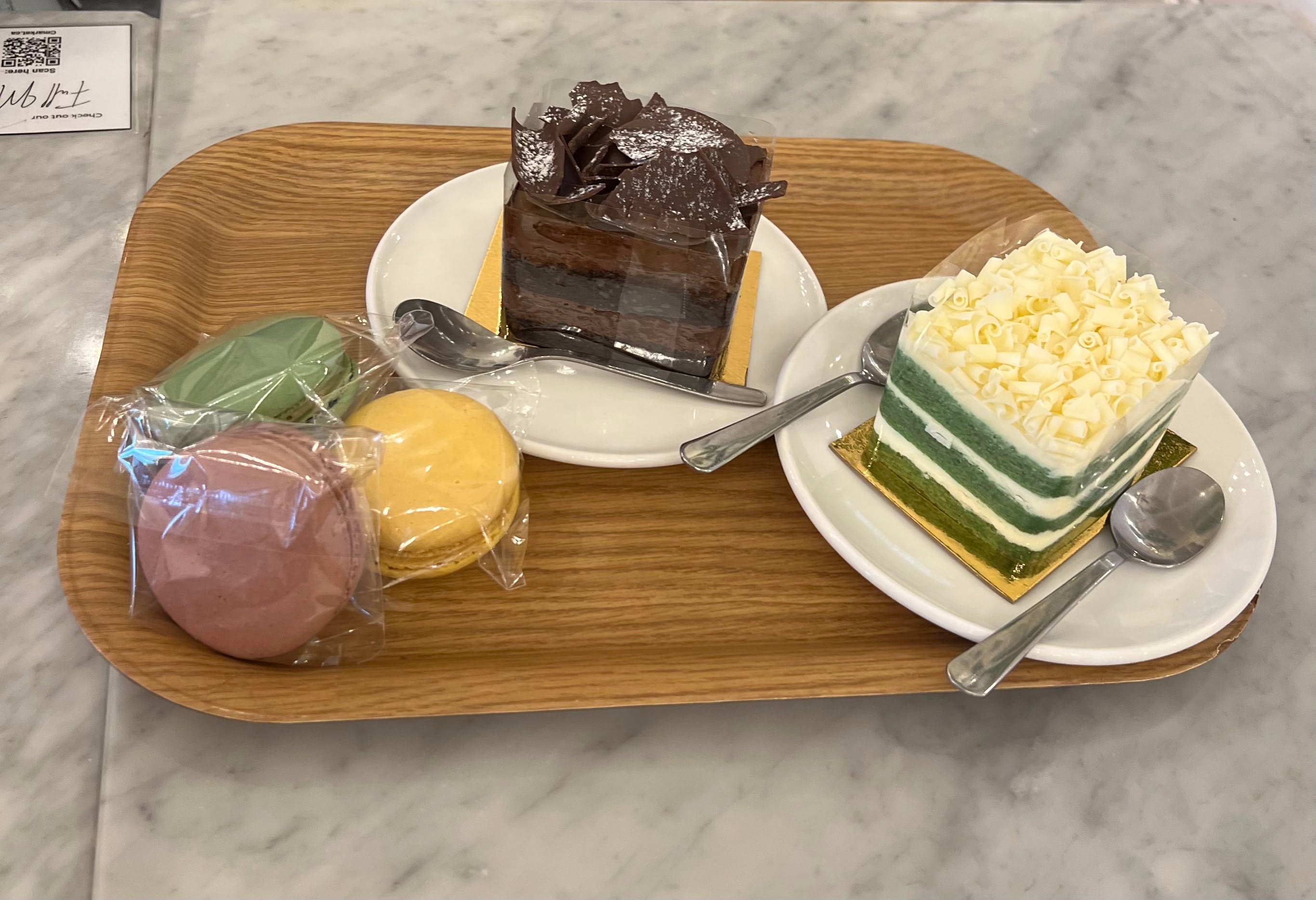 A great ambiance at C Market Coffee with friendly and amazing staff. The macarons, White Chocolate Matcha Cake, and Ultimate Chocolate Cake desserts were all very delicious.