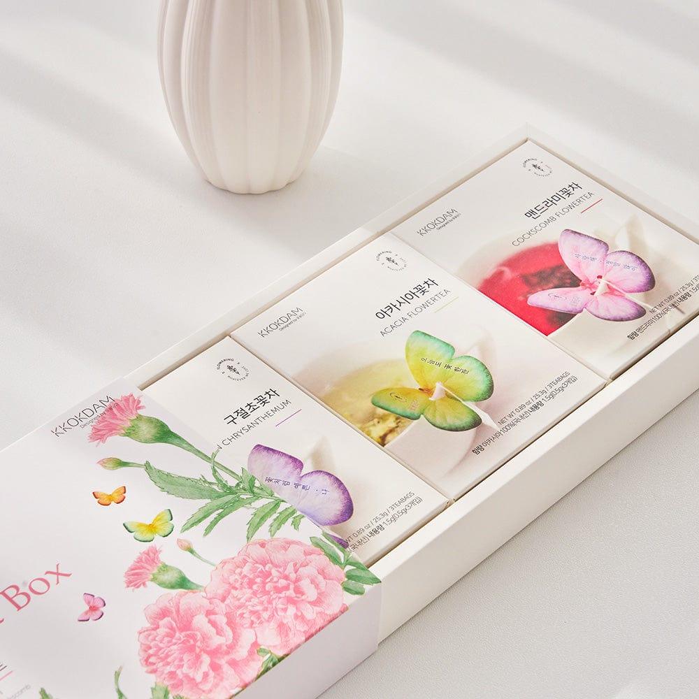 The Butterfly Flower Tea Gift Set (Pink) includes 9 premium tea bags in 3 floral varieties: Cockscomb, Acacia, and Siberian Chrysanthemum. Perfect for tea lovers, it comes with a charming butterfly-shaped holder, combining elegance and flavor in every cup.