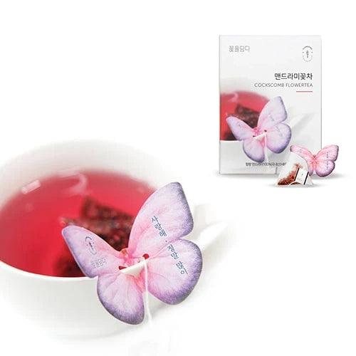 The Cockscomb Butterfly Teabag by KKOKDAM is a unique tea experience, featuring a butterfly-shaped holder that delicately rests on the edge of your cup. The tea, made from Cockscomb flowers, boasts a mild flavor and subtle floral aroma, representing love and passion. This natural, caffeine-free tea is free from additives, offering a smooth and refreshing taste. Sourced from Korea, it delivers a pure and calming tea experience.