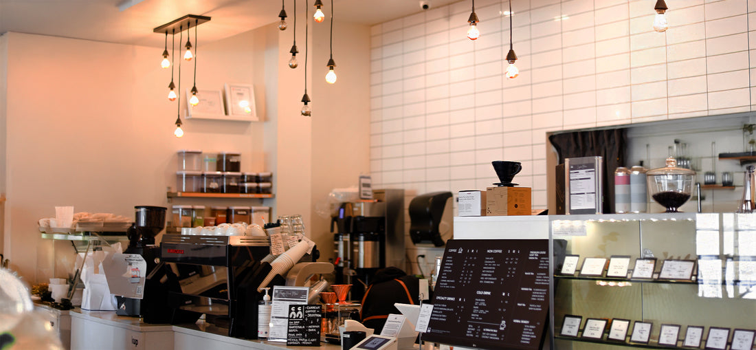 A beautiful countertop display at C Market Coffee featuring freshly baked pastries, perfectly arranged to showcase their golden-brown crusts and delectable appeal, complemented by the modern design of the counter.