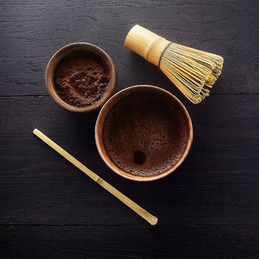 C Market Coffee's Real Chai Powder (200g) features a blend of black tea, ginger, nutmeg, cinnamon, cardamom, clove, and pepper, offering a piquant and spicy flavor with distinct Goan Malabar Coast spice notes. It has a medium caffeine level and can be prepared by mixing 1/2 teaspoon of powder with hot water, followed by steamed milk and sweetener of choice, such as maple syrup or honey.
