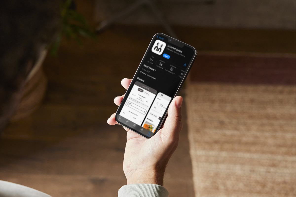 C Market Coffee mobile app available for download from the App Store (iOS) or Google Play (Android), providing easy access to online orders, rewards, and exclusive offers.